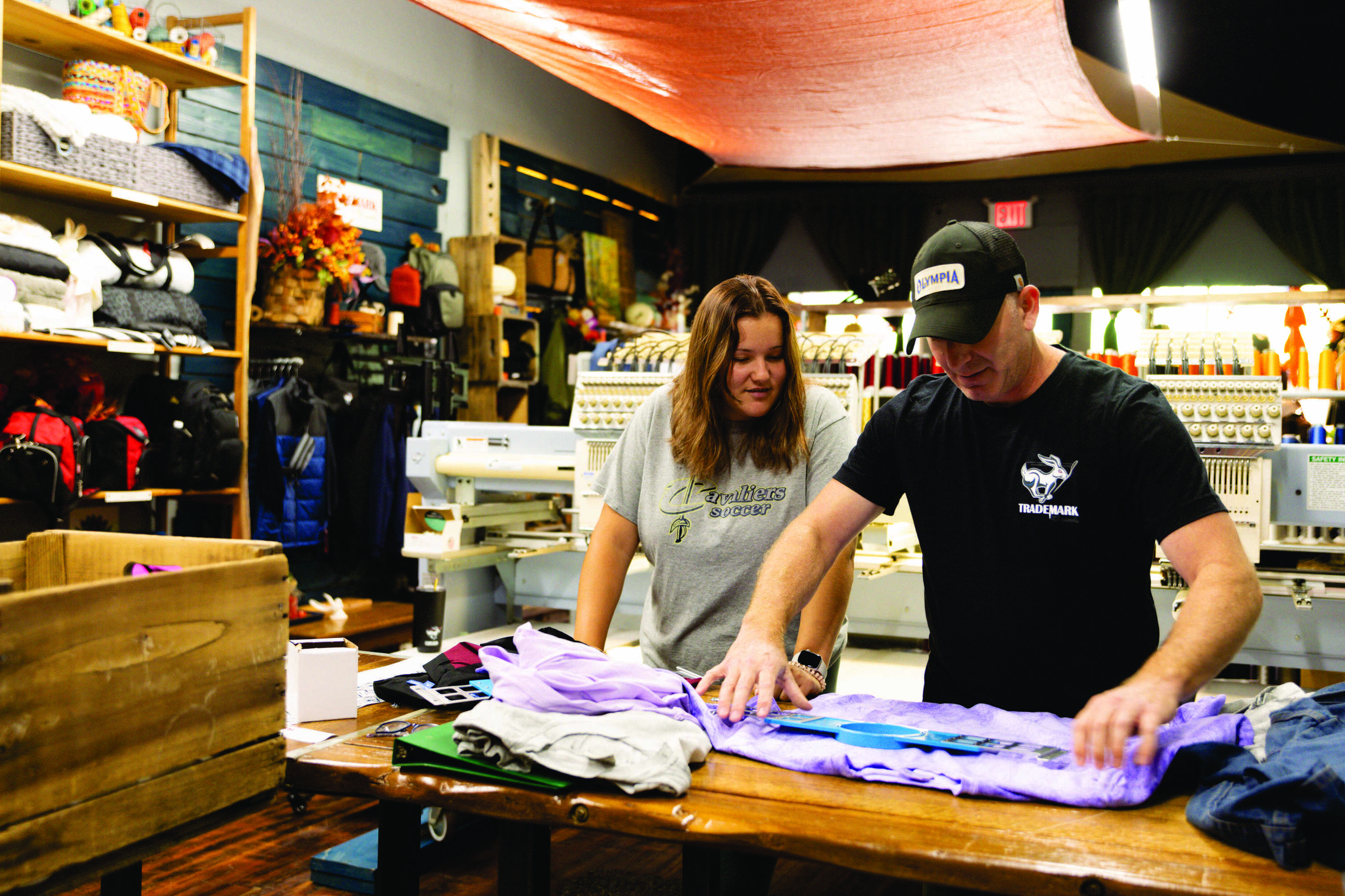 Trademark Threads master technician decorating branded apparel